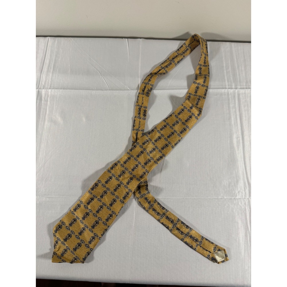 Claiborne Mens Silk Necktie Mustard Yellow Navy Blue Ornamental Crest Pattern
